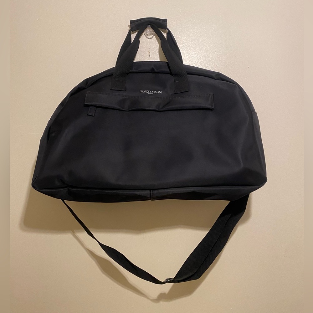 Giorgio Armani Perfums Classic Black Duffel Bag. Unisex model